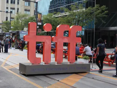 Orange Toronto international film festival sign outdoors.